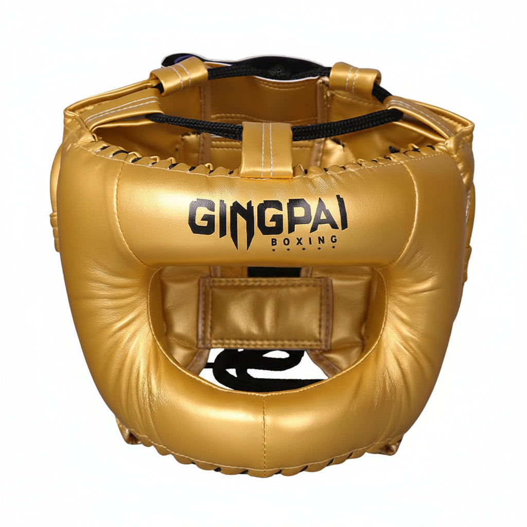 Gold boxing headgear with 'GINGPAI BOXING' branding on a white background